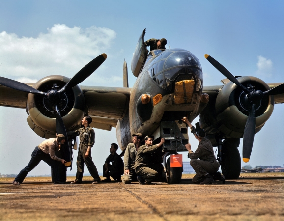 Photo showing: Full Service -- July 1942. Servicing an A-20 bomber at Langley Field, Virginia.