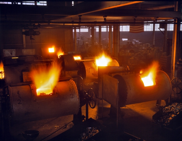 Photo showing: Aluminum Furnaces: 1942 -- Cincinnati, Ohio. Melting furnaces roaring threats to the Axis. Destination of the finished products is kept secret.