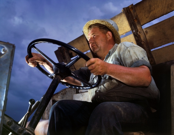 Photo showing: Dam Trucker -- June 1942. Truck driver at the Tennessee Valley Authority's Douglas Dam.
