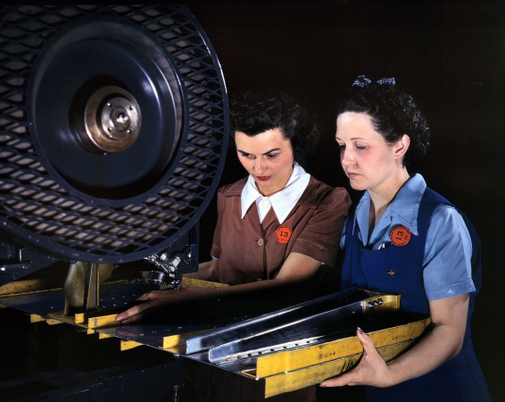 Photo showing: Operation: B-25 -- Punching rivet holes in a frame member for a B-25 bomber at North American Aviation. Inglewood, California, June 1942.
