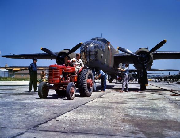 Photo showing: New Model Rollout -- October 1942. Kansas City, Kansas. B-25 bomber at North American Aviation outdoor assembly line.
