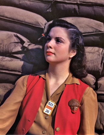 Photo showing: Sand Bag Lunch -- Noontime rest for a full-fledged assembly worker at the Long Beach, Calif. Douglas Aircraft plant, October 1942.