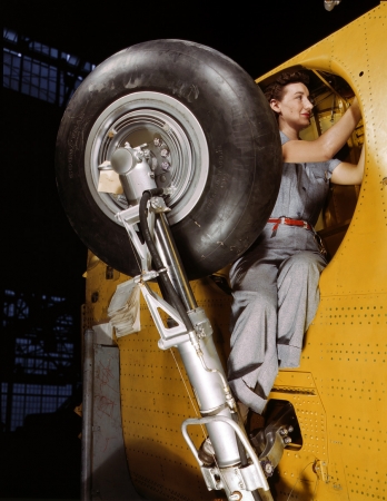Photo showing: Vengeance Landing Gear -- February 1943. Readying a Vengeance dive bomber for landing gear installation at Consolidated-Vultee, Nashville.