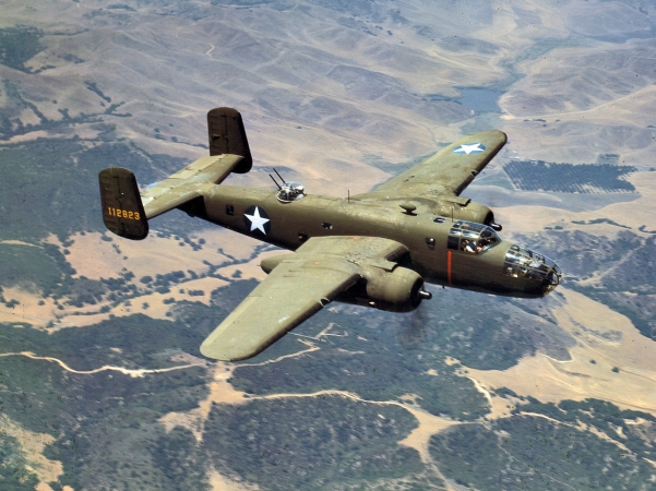 Photo showing: B-25 Over California -- October 1942. North American Aviation B-25 medium bomb over the mountains near Inglewood, California.