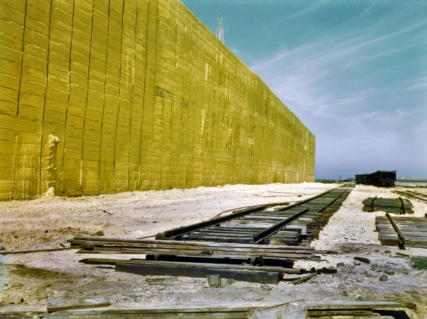 Photo showing: Yellow Rows of Texas: 1943 -- Extracted sulfur stacked in a vat 60 feet tall at Freeport Sulphur Co. in Hoskins Mound, Texas.