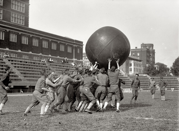 Photo showing: Forward Pass -- A game of pushball at Central Stadium in Washington circa 1923.