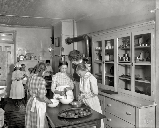 Photo showing: The Peelers -- Neighborhood House kitchen of the Washington, D.C., settlement house, circa 1912.