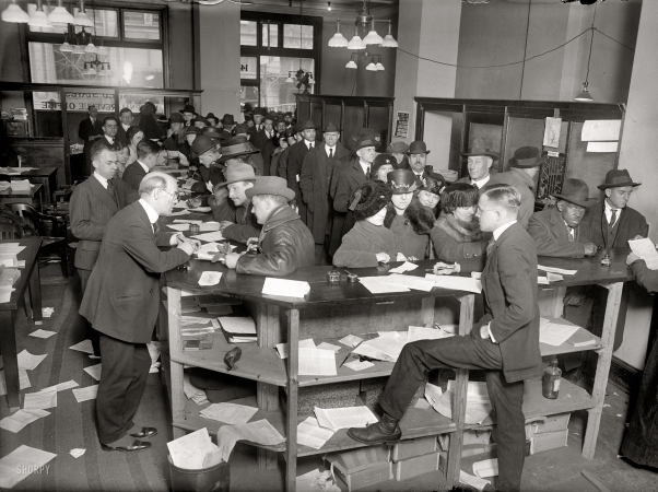 Photo showing: Tax Time: 1920 -- Paying income tax at the Internal Revenue Service in Washington.