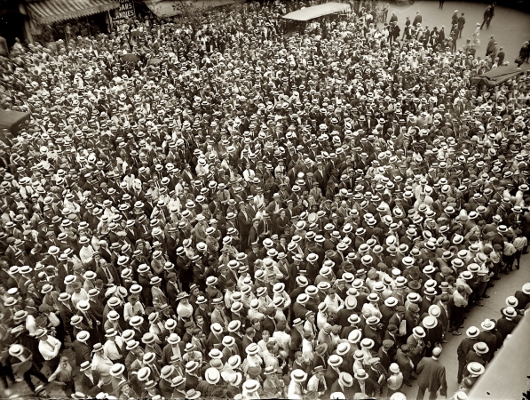 Photo showing: Straw Hat Street Scene -- Washington, D.C. July 2, 1921. Fans following the Dempsey-Carpentier fight at the Washington Star building.