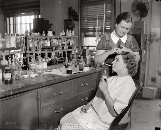 Photo showing: I Could Just Dye -- July 10, 1937. Washington, D.C. Testing cosmetics for the government.