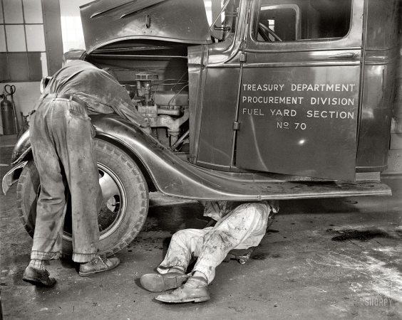 Photo showing: Truckin -- Washington, D.C., circa 1937. Repairing government trucks at the Treasury procurement section.