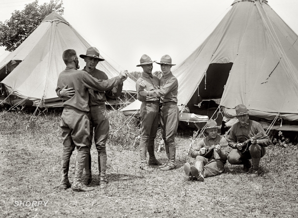 Photo showing: Army Camping -- June 21, 1917. Monmouth Park, New Jersey. Signal Corps men dancing.