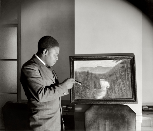 Photo showing: F.B.I. Artiste -- Washington, D.C. October 19, 1938. F.B.I. messenger William Samuel Noisette, 37, to exhibit paintings in one-man show.