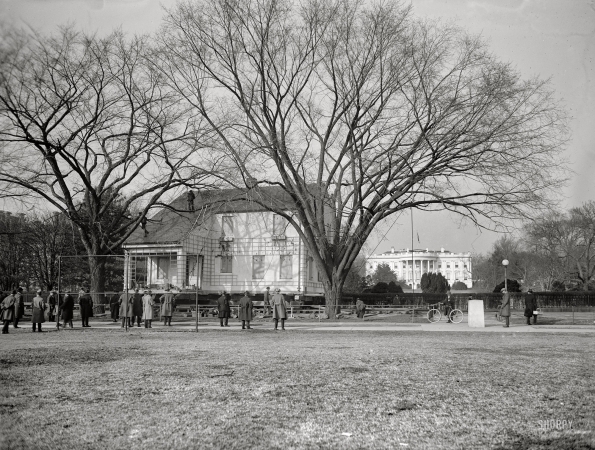Photo showing: Moving Day: 1924 -- Home Sweet Home being moved to its permanent location, passing the south grounds of the White House.