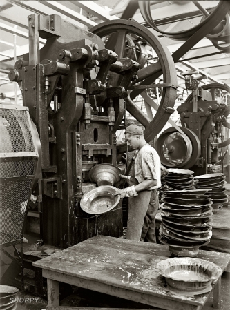 Photo showing: Big Wheel -- Philadelphia, 1925. Atwater Kent radio factory, stamping loudspeaker bells.