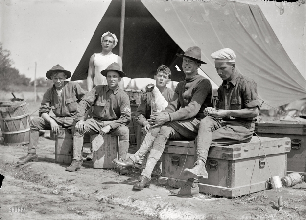 Photo showing: Camp Life -- Circa 1913. Group of soldiers in front of tent, possibly the National Guard camp at Mount Gretna, Pennsylvania.