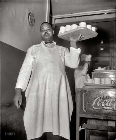 Photo showing: Happy News Waiter -- Happy News Cafe, 1727 Seventh Street N.W. Washington, D.C., circa 1937.