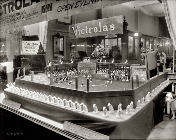 Photo showing: Nipper at Bat -- Washington, D.C. Ansell, Bishop & Turner window display. 1920.
