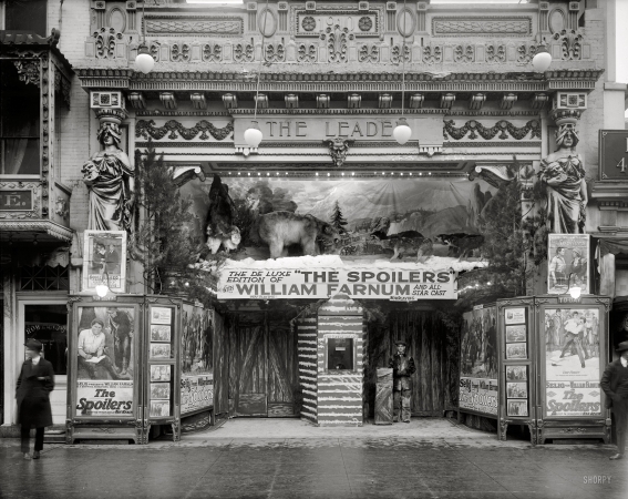 Photo showing: Blockbuster Ballyhoo -- Sidney Lust's Leader Theater elaborately decked out for the de luxe edition of The Spoilers, circa 1920.
