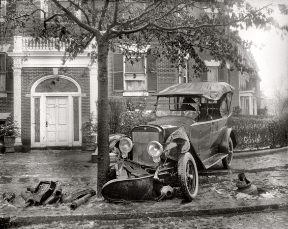 Photo showing: Senatorial Smash-Up -- January 1921. Washington, D.C. Senator Boies Penrose's (R-Pa.) car took out a mailbox, emergency call box and a lamppost.
