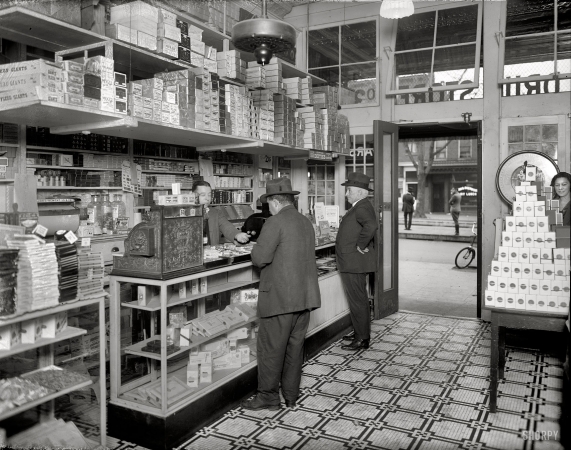 Photo showing: Drug Store Customers -- Washington circa 1920. People's Drug Store, 14th and U.