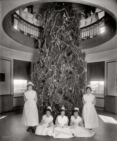 Photo showing: Double-Decker -- Garfield Hospital Christmas tree. Nurses at the Washington, D.C., hospital circa 1921.