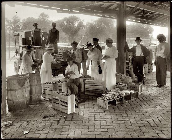 Photo showing: Potatoes, Corn, Apples -- Washington, D.C., produce market circa 1917.
