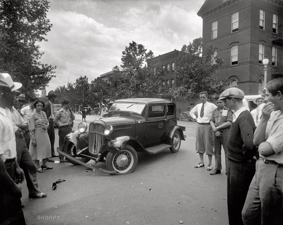 Photo showing: Accident Reconstruction -- Washington, D.C., circa 1932. Street scene, auto accident, 14th and Q streets N.W.