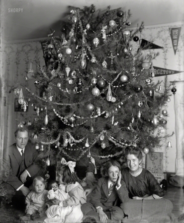 Photo showing: A Christmas Carol -- Dickey family and Christmas tree, 1913.