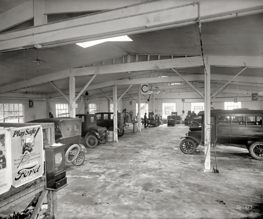Photo showing: All Repairs Strictly Cash -- Rockville, Maryland, circa 1925. Montgomery County Motor Co.