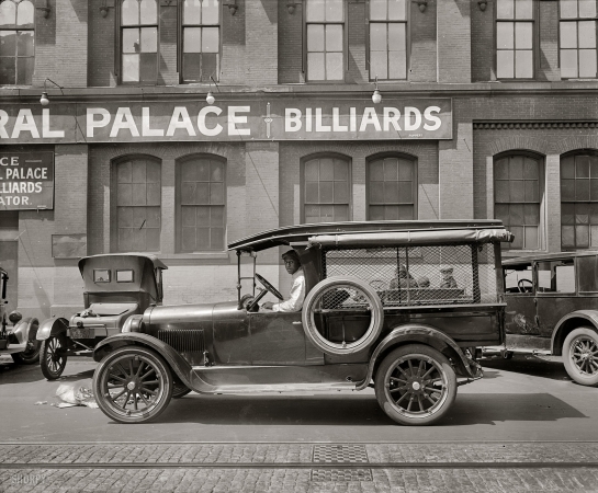 Photo showing: Truck Pool -- A Dodge truck outside the Grand Central Palace pool hall in Washington, Pennsylvania Ave. and Seventh Street N.W., 1926.