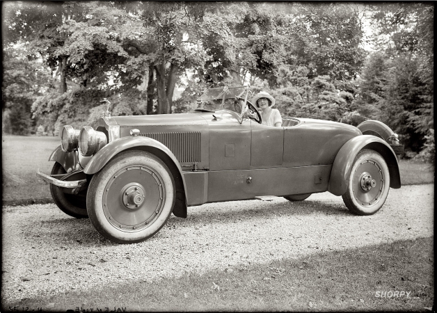 Photo showing: Packard V-12 Roadster -- At the wheel: actress Grace Valentine, circa 1920.