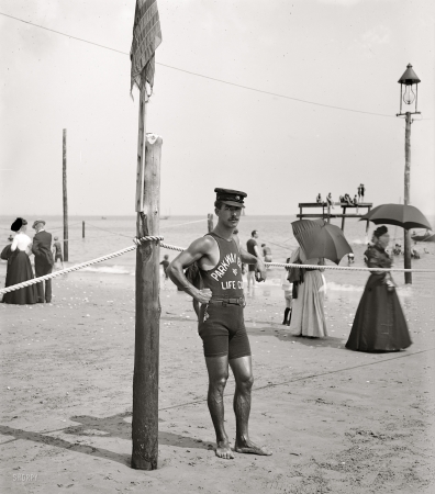 Photo showing: Tan and Tall -- Brighton Beach life guard.