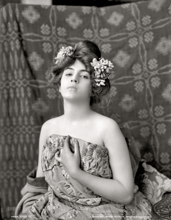 Photo showing: Flowers in Her Hair -- Amorita circa 1900.
