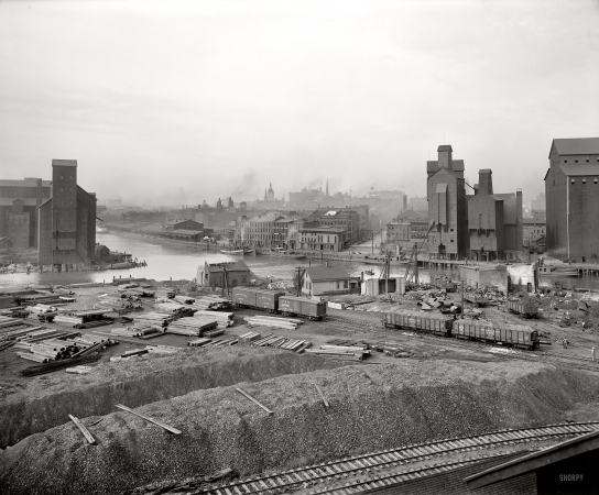 Photo showing: Buffalo Elevators -- Buffalo, New York circa 1900. Creek and elevators near foot of Main Street