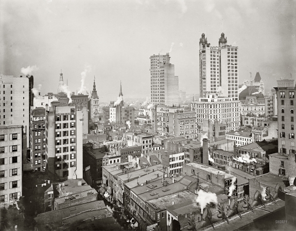 Photo showing: Financial District: 1900 -- New York City from the Woodbridge Building. The Park Row building at right was the world's tallest office tower.