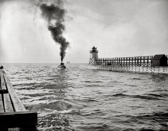Photo showing: Charlevoix -- Harbor entrance and light house, Charlevoix, Michigan, circa 1900.