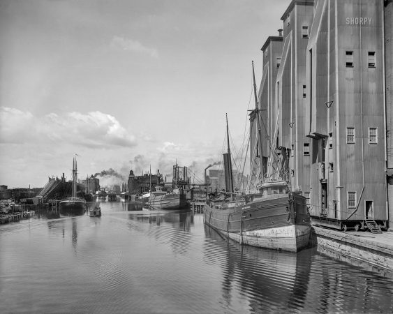 Photo showing: Amber Ripples -- Buffalo, New York, circa 1900. Unloading grain at the Great Northern elevator.