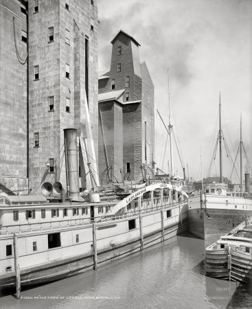 Photo showing: Buffalo City Ship Canal -- Buffalo, circa 1900. The Badger State at the Connecting Terminal grain elevator.