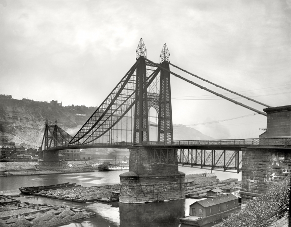 Photo showing: Point Bridge -- Pittsburgh circa 1900. Point Bridge and coal barges. Also the Duquesne Incline railway. 