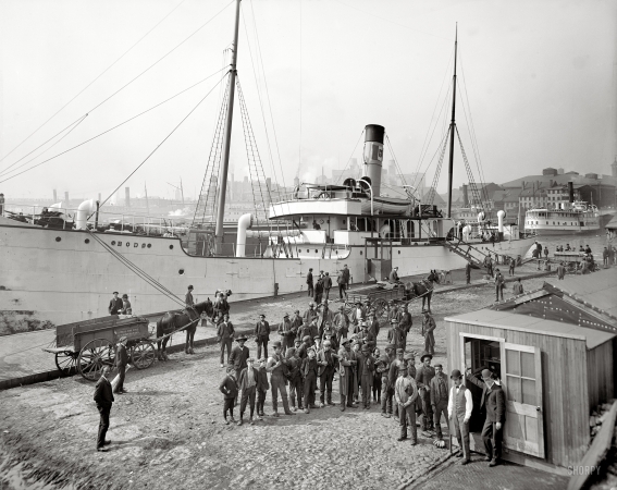 Photo showing: On the Waterfront -- Baltimore, Maryland, circa 1905. Payday for the stevedores.