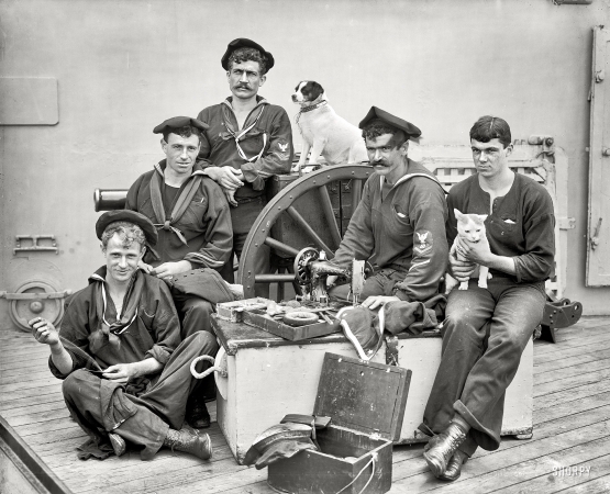Photo showing: Keeping Them in Stitches -- Aboard the U.S.S. New York circa 1896 with the ship's tailor, clientele and friends.