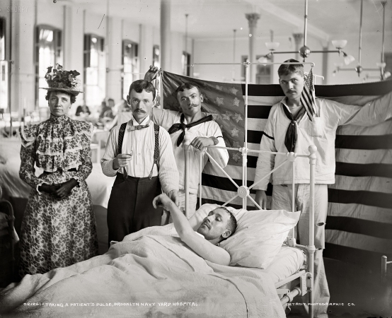 Photo showing: Special Treatment -- Taking a patient's pulse, Brooklyn Navy Yard Hospital, New York circa 1901.