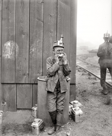 Photo showing: Working Lunch -- Kingston, Pennsylvania, circa 1900. Breaker boy, Woodward coal mines.