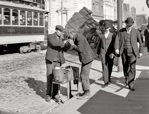 Photo showing: Chestnuts Roasting: 1905 -- Baltimore, Maryland. A chestnut vendor.