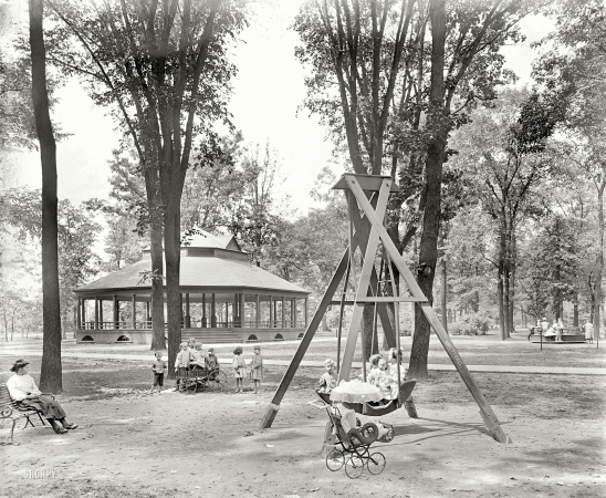Photo showing: Little Swingers -- Detroit, Michigan, circa 1900. Scene in Clark Park.
