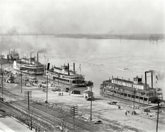 Photo showing: Jim, Joe and Harry -- Memphis circa 1900. Mississippi River levee. Steamboats James Lee, Harry Lee and City St. Joseph.