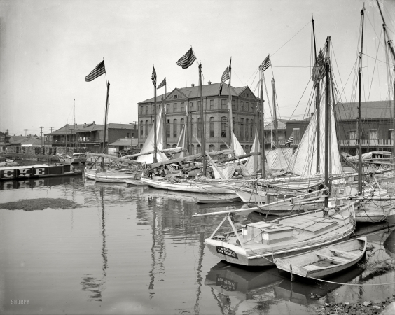 Photo showing: New Orleans Luggers -- New Orleans circa 1908. Oyster and charcoal luggers in the old basin.