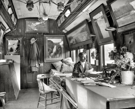 Photo showing: DPC Special -- 1902 or earlier. Detroit Photographic Co. Special -- William Henry Jackson
seated at table in Delaware, Lackawanna & Western Railroad car.