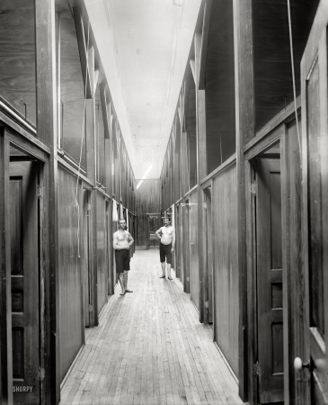 Photo showing: Bathhouse -- Ypsilanti, Michigan, circa 1900. Two men in corridor of Mineral Bath House.